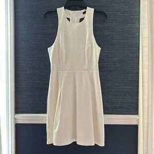 Lulus white skater dress size medium. High neck line with cut outs on low back.